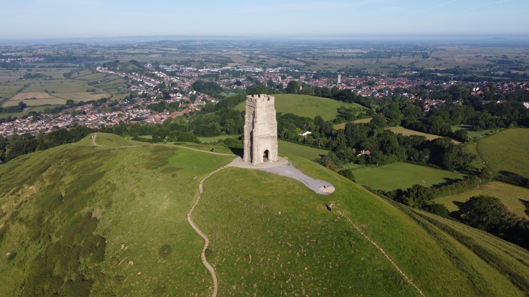 An aerial view of a tower on a hill