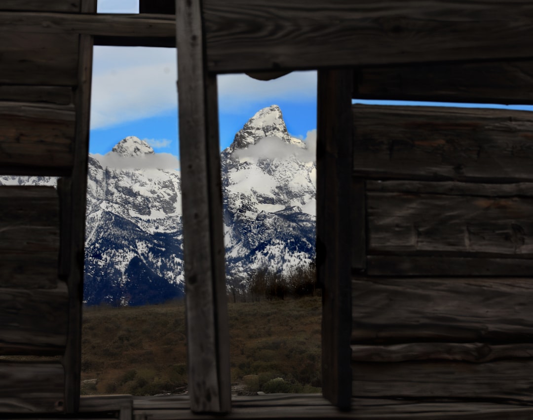 A view of a mountain range through a window