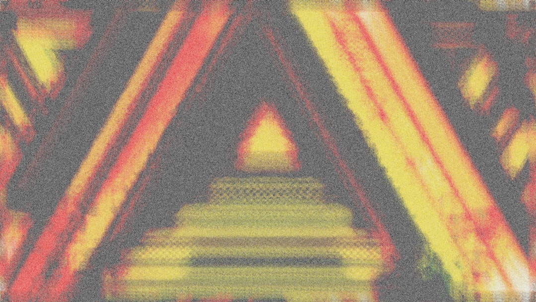 A blurry image of a triangle with a triangle in the middle